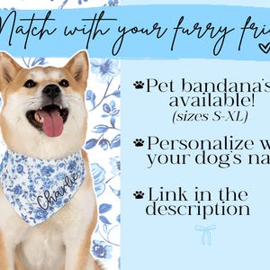 May include: A Shiba Inu dog wearing a blue and white floral patterned bandana with the name "Charlie" on it. The image includes text that says "Match with your furry friend!" and "Pet bandana's available!" with sizes S-XL.