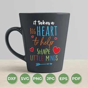 May include: A black coffee mug with a white design that reads "it takes a BIG HEART to help SHAPE LITTLE MINDS". The design includes a red arrow and hearts.