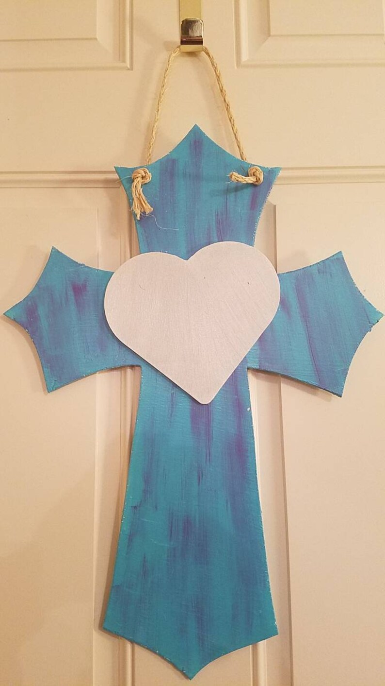 Double-sided cross door or wall hanger