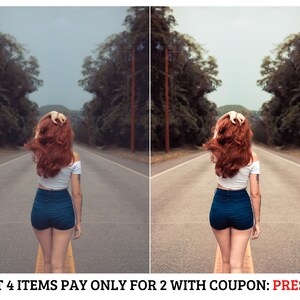 May include: A woman with long red hair walks down a paved road with trees on either side. She is wearing a white crop top and blue denim shorts.