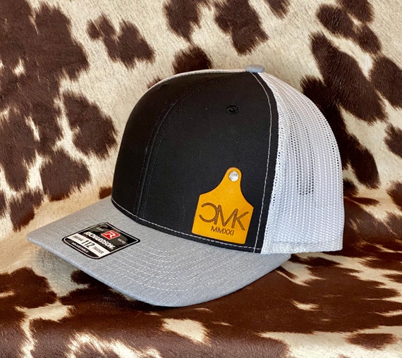 YOUR BRAND Leather Ear Tag Trucker Hat 