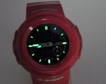 Reloj analógico digital rosa AW-582SC CASIO resistente a golpes G