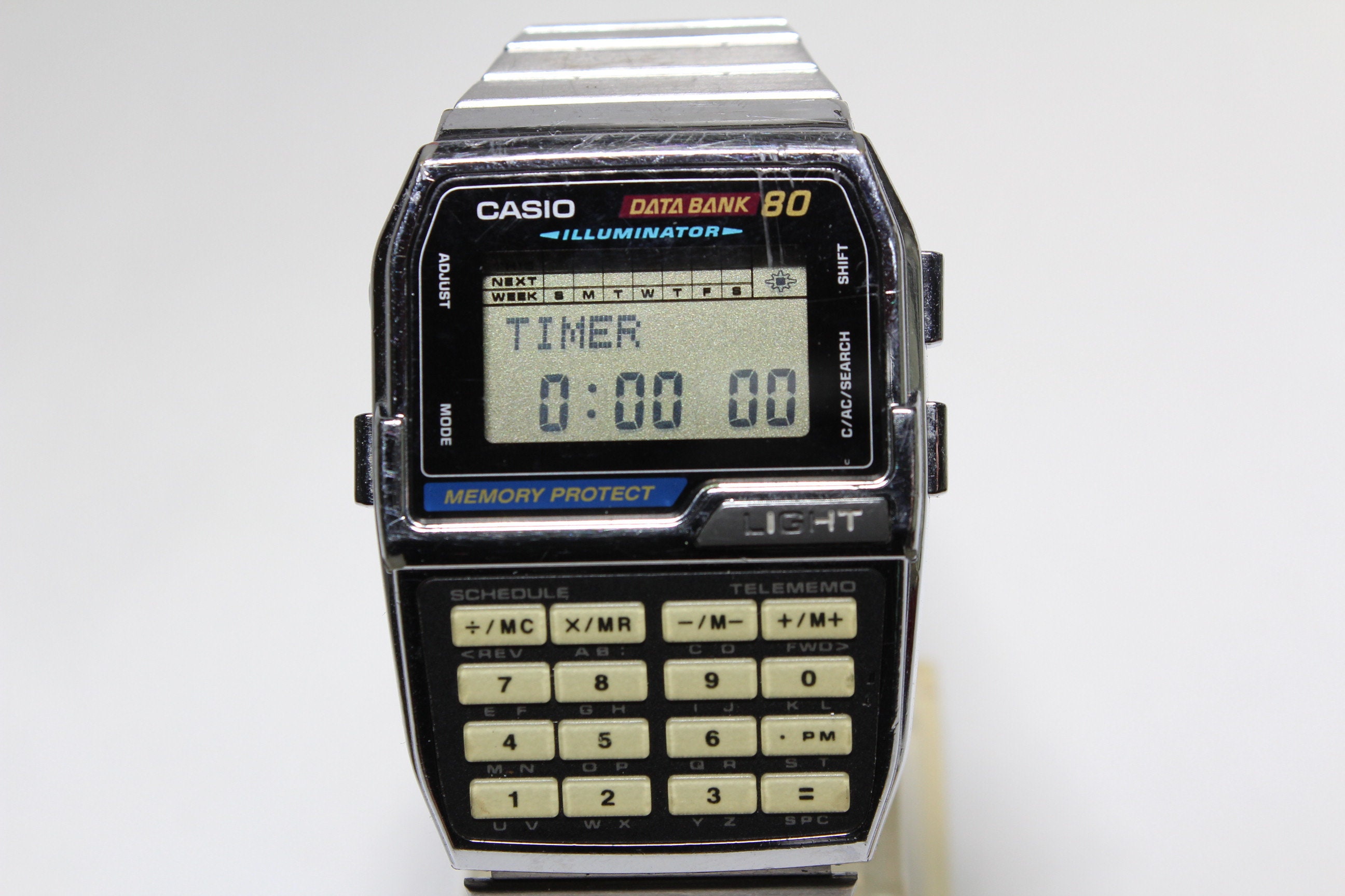 Casio DATA BANK 80 DBC-810 Silver Memory Protect Retro Watch