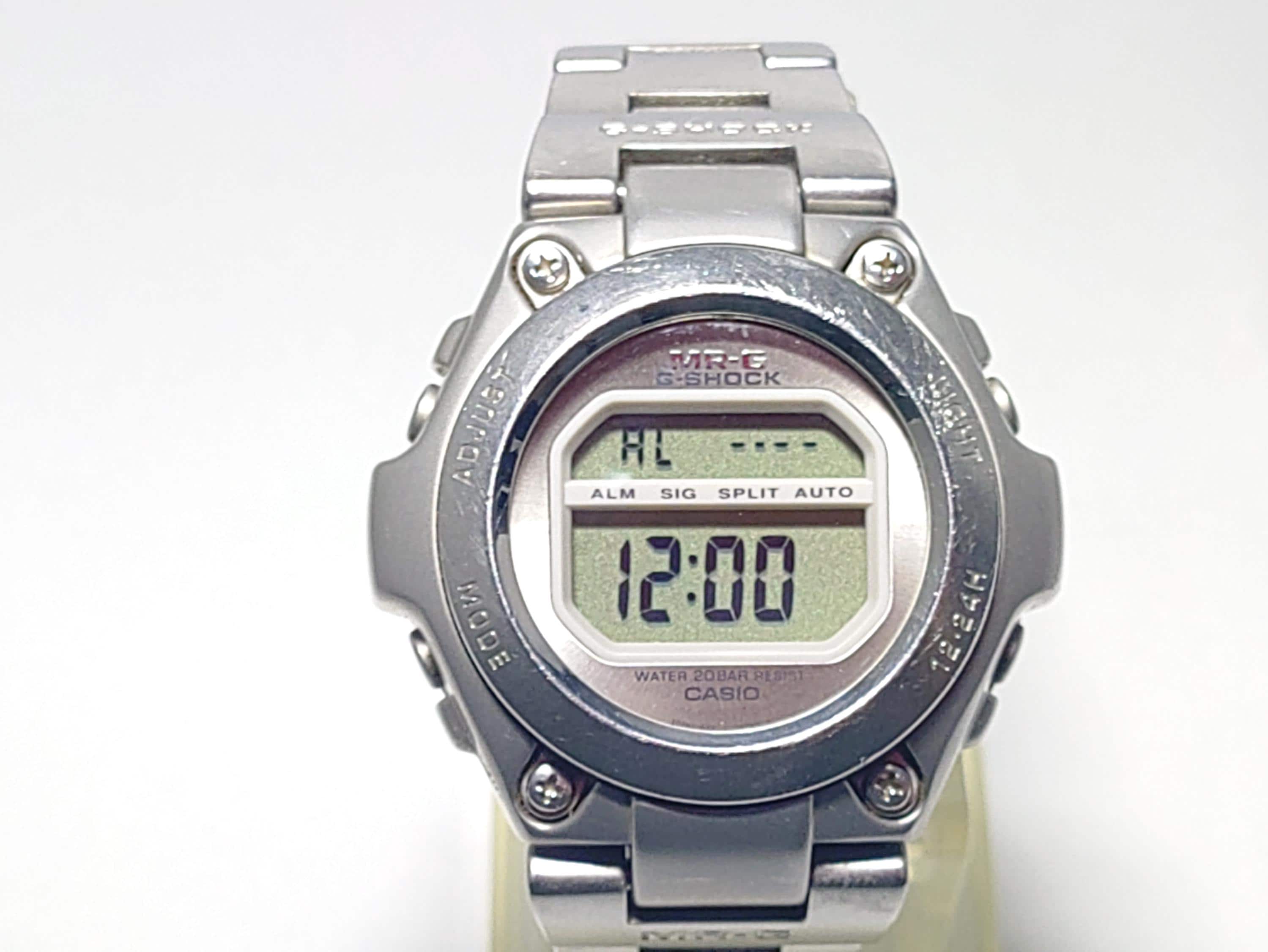 G-SHOCK MR-G 100 デジタル腕時計 ステンレス ジャンク il_fullxfull.7323087618_jrxd.jpg