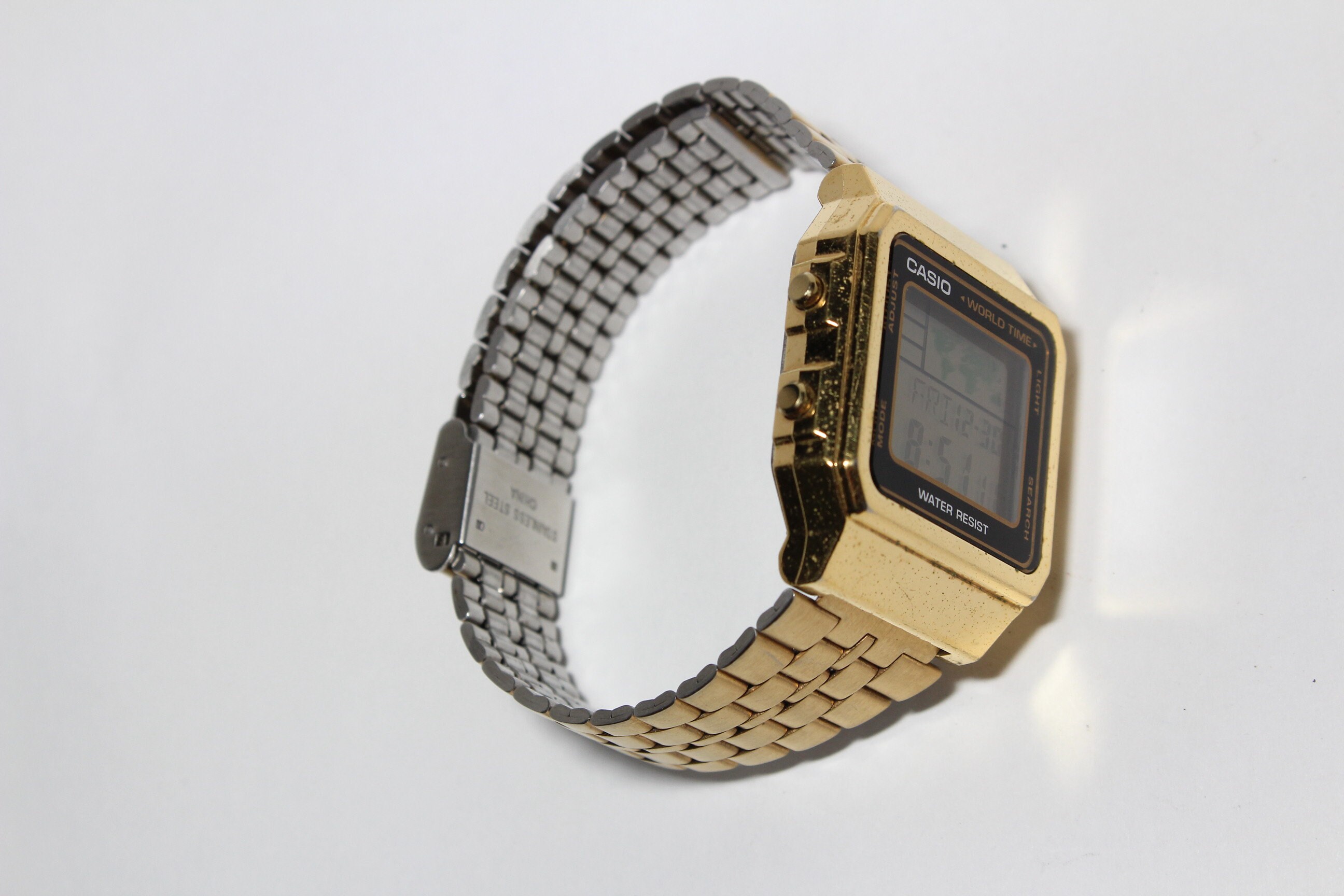 Gold casio world time hotsell
