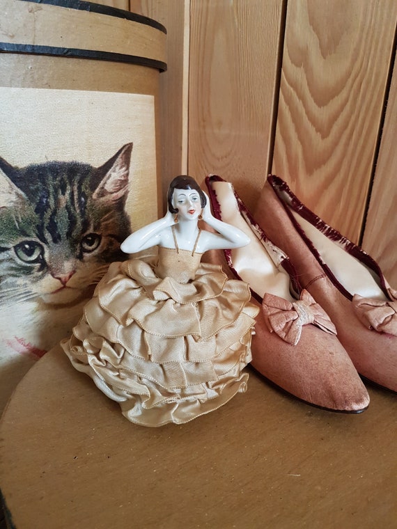 Beautiful old Half Doll on pedestal. Antique dress