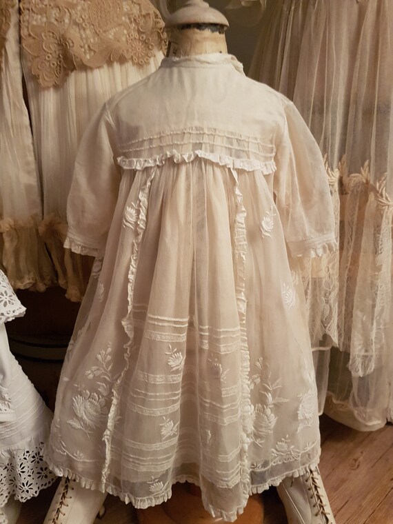 Pretty little girl's dress and her silk lining. An