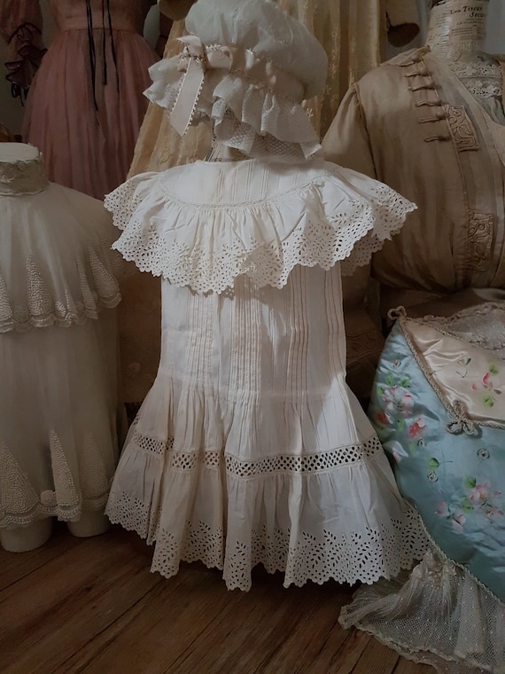Cute little girl dress in white cotton. Antique dr