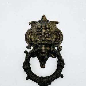 Vintage bronze door knocker