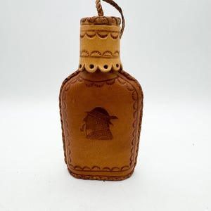 Vintage leather cover hip flask