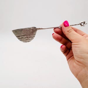 Vintage hammered aluminium water ladle, African handmade art