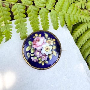 Antique hand painted floral ceramic brooch