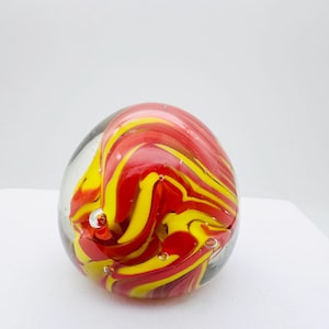Red & yellow swirl paperweight, glass paperweight