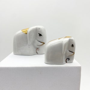 Pair of small porcelain elephants