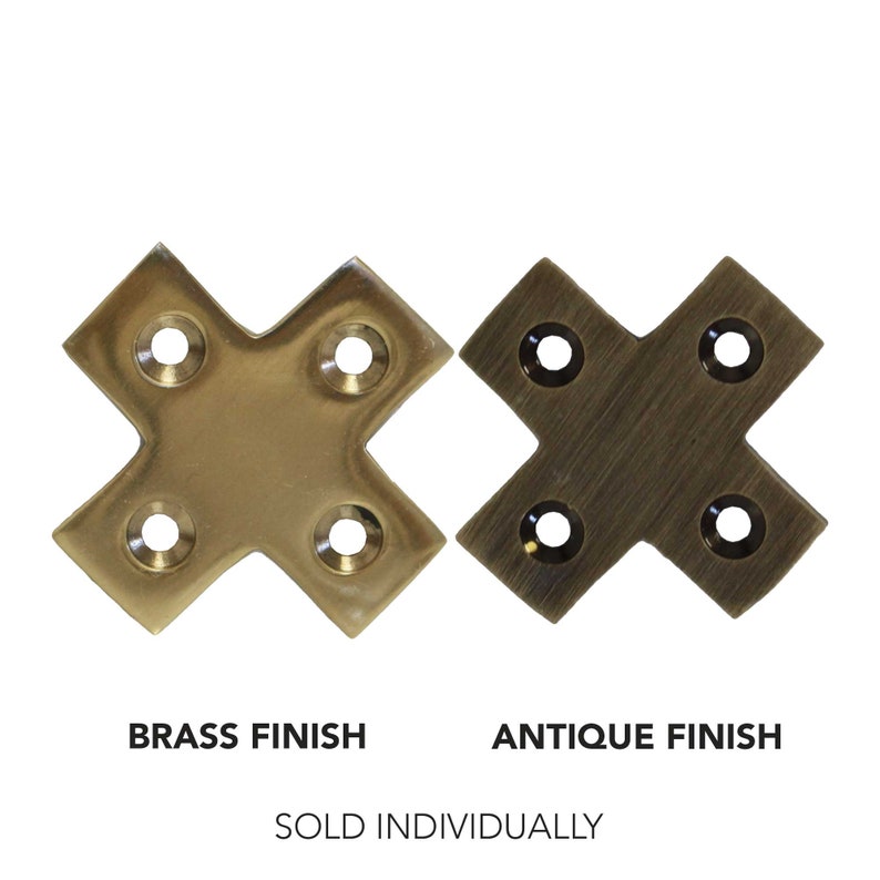 May include: Two brass corner brackets, one with a polished brass finish and the other with an antique brass finish. The brackets are shaped like an 'X' with four holes in each corner.