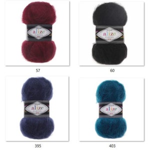 May include: Four skeins of Alize Classic yarn in various colors: deep red (57), black (60), navy blue (395), and teal (403). Each skein is labeled with the Alize Classic brand name.