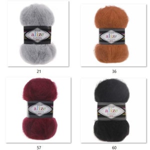 May include: Four skeins of Alize Classic mohair yarn in various colors: gray (21), rust (36), burgundy (57), and black (60). Each skein is wrapped with a label featuring the Alize logo and product information. Ideal for knitting and crochet projects.