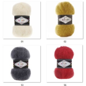 May include: Four skeins of Alize Classic mohair yarn in various colors: off-white, mustard yellow, dark gray, and red. Each skein is labeled with the brand name and a product number. The yarn is soft and fluffy, ideal for knitting or crocheting projects.