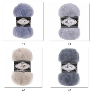 May include: Four skeins of Alize Classic mohair yarn in various colors: light blue (40), light grey (52), beige (67), and dark grey (87). Each skein is wrapped with a label featuring the brand name and product details.