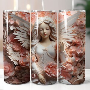 May include: A white angel figurine with wings, surrounded by pink paper flowers, on a stainless steel tumbler.