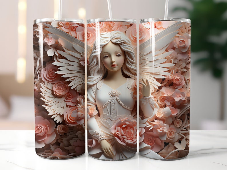 May include: A white angel figurine with wings, surrounded by pink paper flowers, on a stainless steel tumbler.