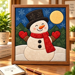 May include: A framed wall art piece featuring a white snowman with a black top hat, a red scarf, and red mittens. The background shows a dark blue sky with white snowflakes, a yellow moon, and green mountains. The snowman has two black buttons.