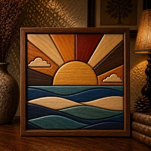 May include: A square wooden wall art piece featuring a multi-colored geometric sunrise over stylized ocean waves. The sun is a golden semi-circle with radiating beams in shades of brown, orange, and red, accompanied by two small wooden clouds.