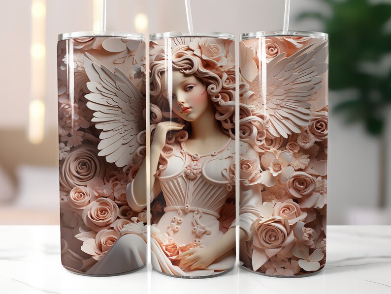 May include: Three stainless steel tumblers with a design of an angel with wings, surrounded by pink flowers. The angel is wearing a white dress with a corset-like bodice.