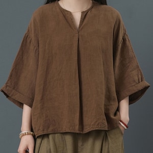 Summer chic! handmade women&#39;s Linen V-Neck T-Shirt. Comfy half-sleeves and a loose plus-size fit make it perfect for casual wear