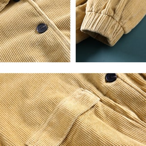 May include: A close-up of a light brown corduroy jacket with a button closure and a patch pocket. The jacket has a ribbed texture and a relaxed fit.