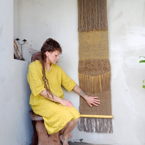 Hand-woven art for wall decoration in a rustic wabi-sabi style, Yellow earthy colors, long wall fabric, Raw textured art fabric for the wall