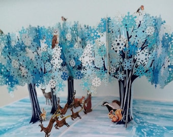 Christmas pop up card with Sleigh and wildlife in forest, Father Christmas, robins, barn owl, deer, reindeer, badger, fox, trees, magical