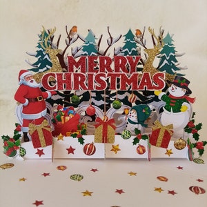 Biglietto pop-up di Natale/Babbo Natale/pettirossi/renne/pupazzi di neve/scena nel bosco