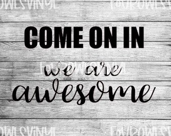 May include: Black and white sign with the text "Come on in we are awesome" on a woodgrain background.
