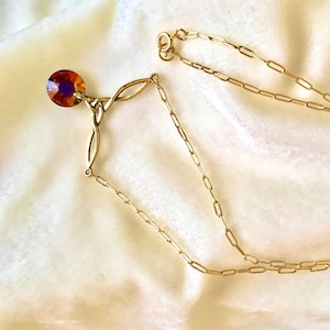 Swarovski Crystal Volcano Sun Necklace: Antique Gold Firebird, 17” Paperclip Chain