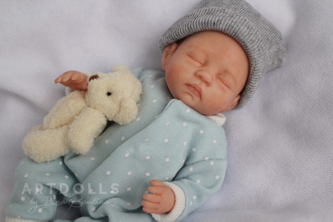realistic miniature baby dolls