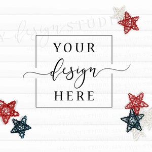 May include: White wood background with the text "YOUR design HERE" in a black rectangle.  Red, white, and blue woven star decorations are scattered around the rectangle.
