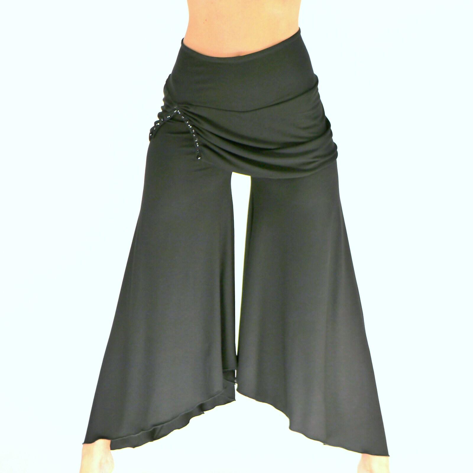 Black flared trousers with skirt and rhinestones
