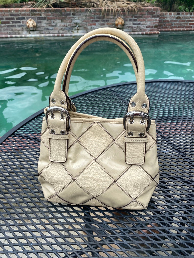 pale yellow handbag