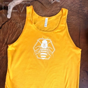 Débardeur unisexe sérigraphié à l’abeille géométrique, goldenrod jaune unisexe Jersey Bella + char en toile, débardeur nature