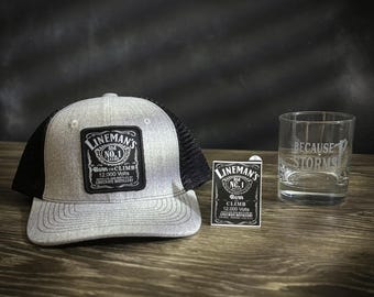 LineMan's Born to Climb Hat, Sticker, and Because Storms Whiskey Glass Bundle