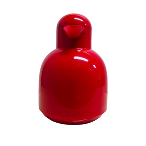 May include: A red, bird-shaped thermal carafe with a spout on the top.