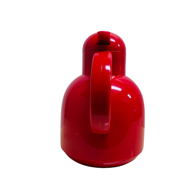 May include: A red insulated carafe with a handle and a spout. The carafe is made of plastic and has a glossy finish.