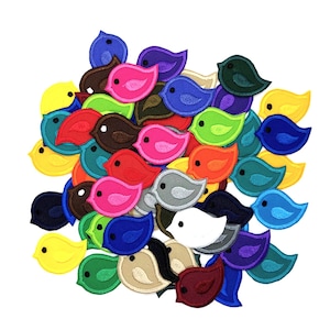 May include: A collection of colorful felt bird patches in various shades of blue, green, yellow, red, pink, and white. The patches are arranged in a random pattern and are perfect for adding a touch of whimsy to clothing, bags, or other crafts.
