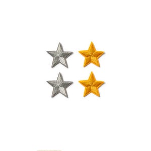 May include: Four embroidered stars, two silver and two gold, on a white background.