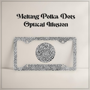 May include: A license plate frame with a black and white polka dot pattern and a central circular design. The frame has the text "Melting Polka Dots Optical Illusion" in black script above it.