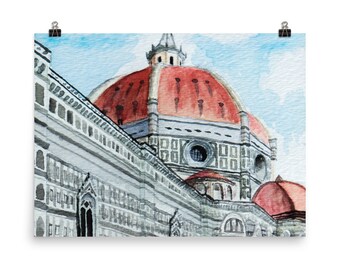 May include: Watercolor painting of the Duomo in Florence, Italy. The painting shows the iconic dome of the cathedral, with its red terracotta tiles and intricate details. The surrounding buildings are also depicted in a muted gray, creating a sense of depth and perspective.