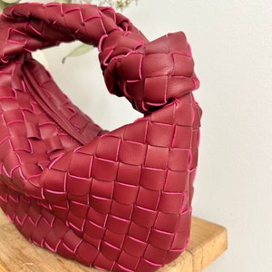 woven knot bag, burgundy jodie bag, bottega veneta woven style bag, small jodie bag