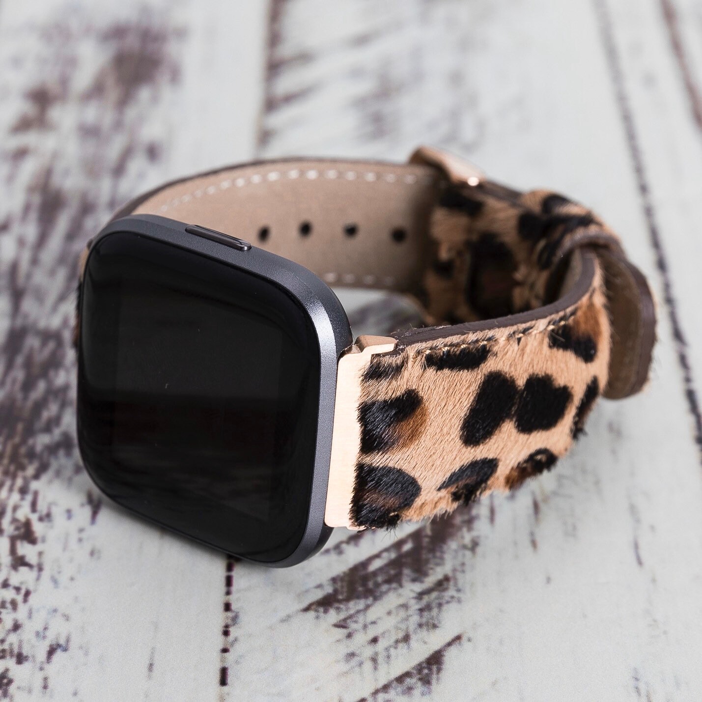 gold fitbit versa band