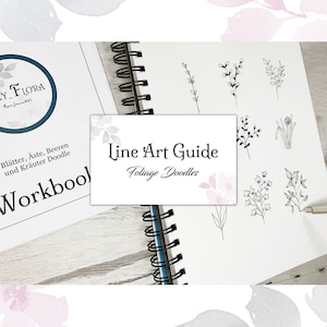 May include: A white notebook with a black spiral binding. The notebook has a black and white line art guide for foliage doodles. The text "Line Art Guide Foliage Doodles" is printed on a white card in front of the notebook.